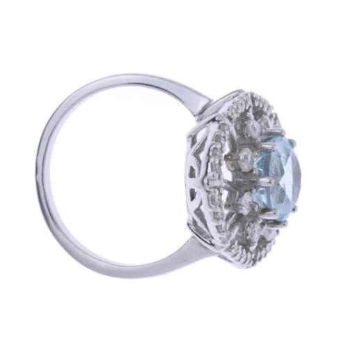 WHITE GOLD RING WITH DIAMONDS AND TOPAZ.