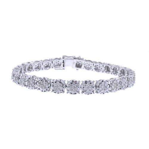 WHITE GOLD BRACELET WITH DIAMONDS ROSETTES.