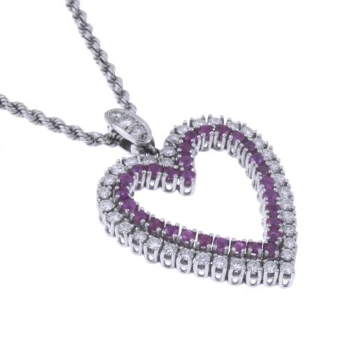 NECKLACE WITH DIAMONDS AND RUBIES HEART PENDANT.