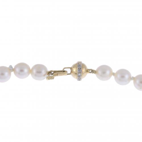 Collar de perlas.