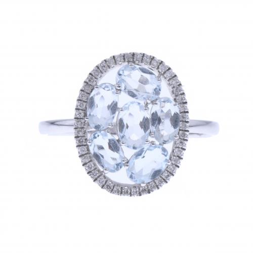 SORTIJA CON DIAMANTES Y TOPACIOS.