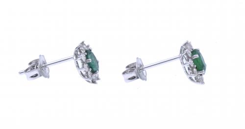 DIAMONDS AND EMERALDS ROSETTE EARRINGS.