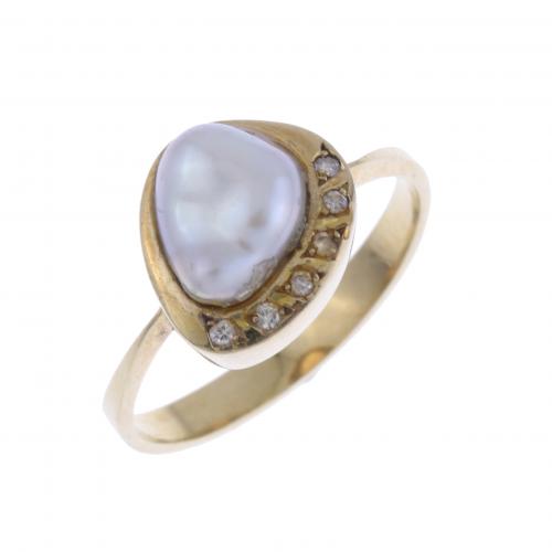 RING WITH BAROQUE PEARL.