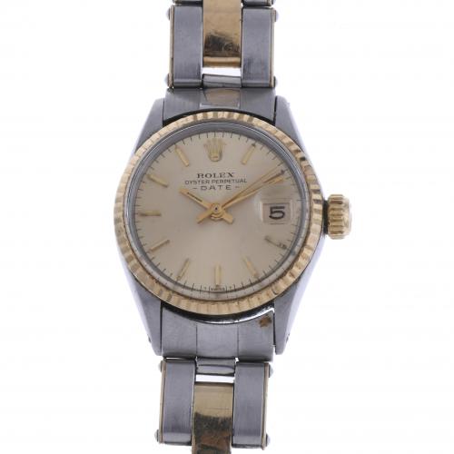 ROLEX. OYSTER PERPETUAL DATE. WOMAN'S WRISTWATCH.