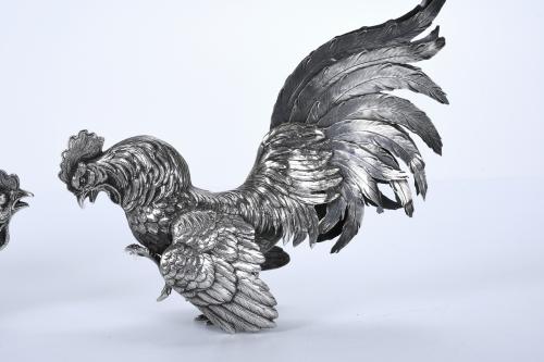 TWO SPANISH SILVER ROOSTERS, MID 20TH CENTURY.