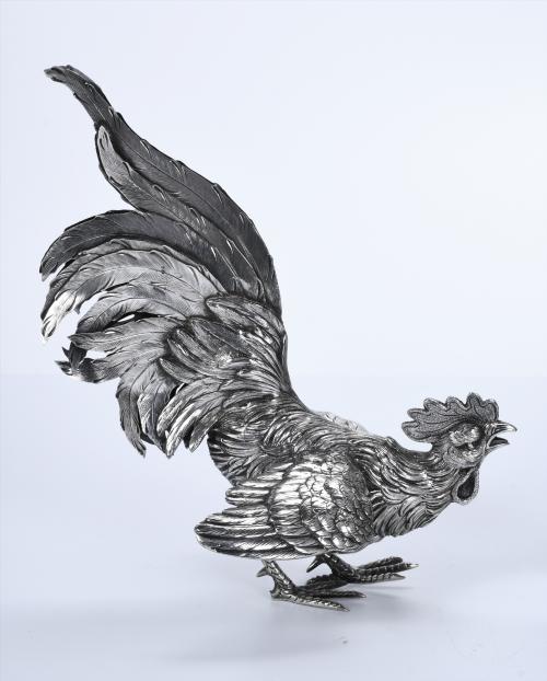 TWO SPANISH SILVER ROOSTERS, MID 20TH CENTURY.