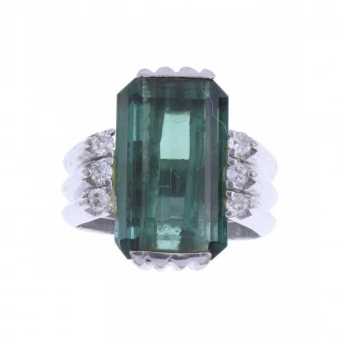 RING WITH GREEN GLASS AND DIAMONDS.