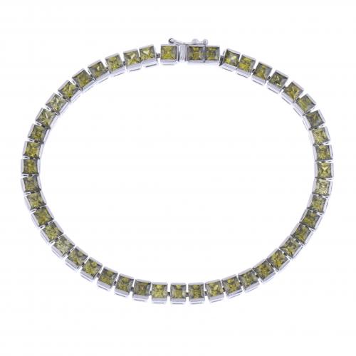 RIVIÈRE BRACELET WITH PERIDOTS.