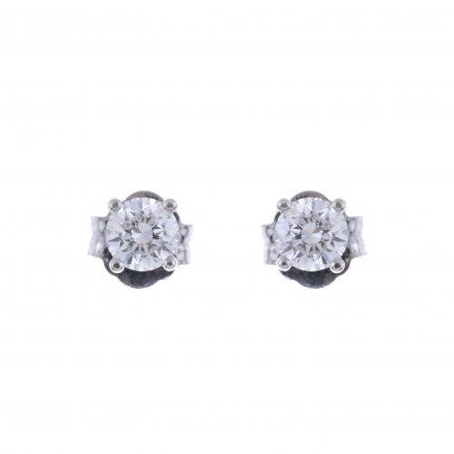 DIAMOND STUD EARRINGS.