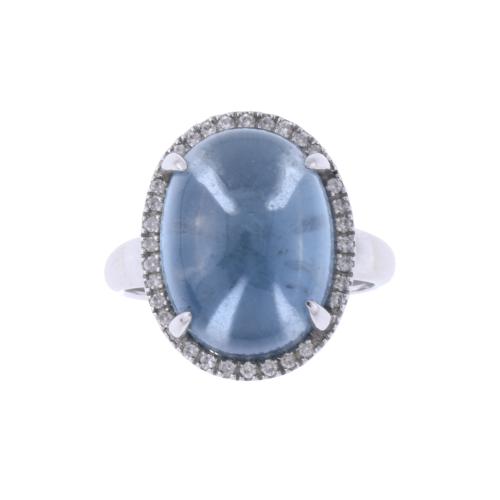 RING WITH BLUE TOPAZ AND DIAMONDS.