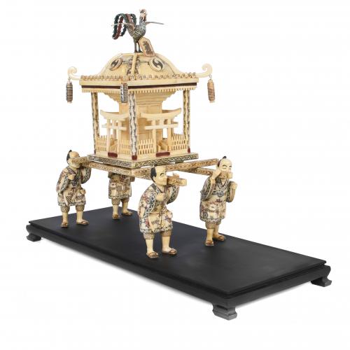CHINESE BONE CARVING, "CEREMONIAL GAIT WITH PAGODA", 20TH CENTURY. 