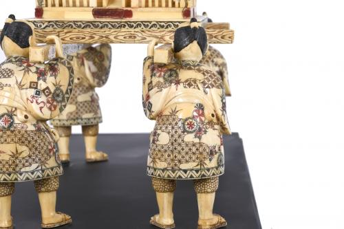 CHINESE BONE CARVING, "CEREMONIAL GAIT WITH PAGODA", 20TH C