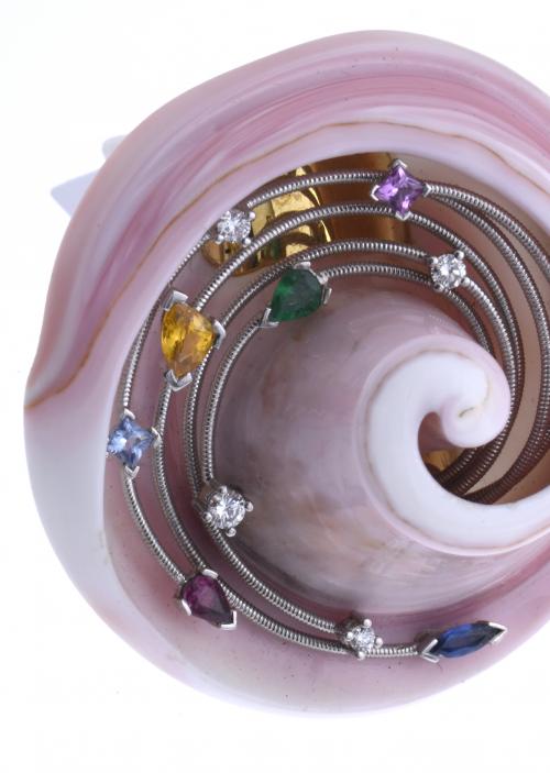LARGE SHELL RING WITH COLOURED STONES AND DIAMONDS.