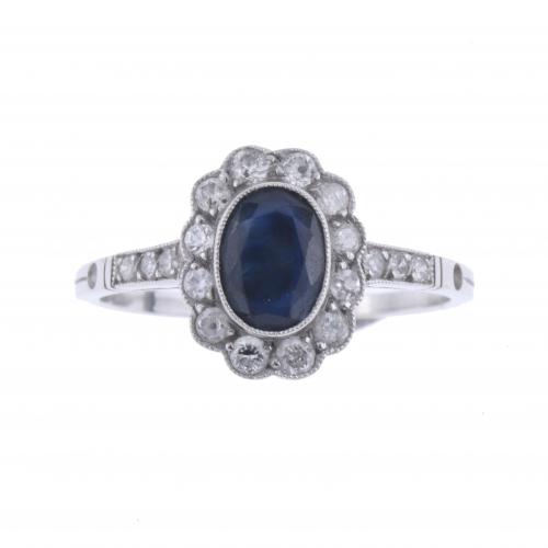 ROSETTE RING WITH SAPPHIRE.