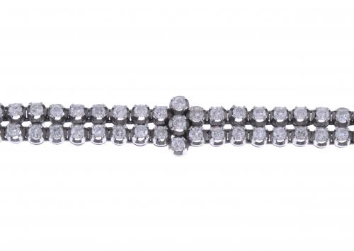 PULSERA RIVIÈRE DOBLE DE DIAMANTES.