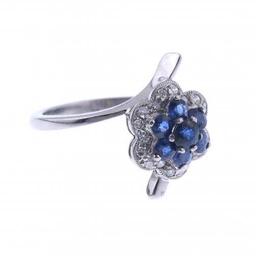 SAPPHIRES AND DIAMONDS FLORAL RING.