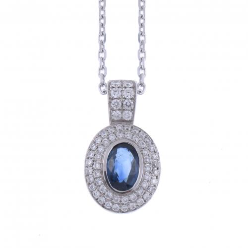 COLGANTE ROSETÓN CON DIAMANTES Y ZAFIRO.