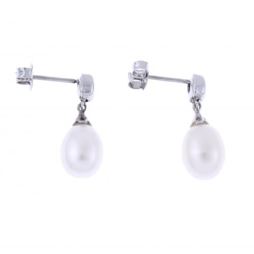 LONG EARRINGS WITH DIAMONDS AND PEARL.
