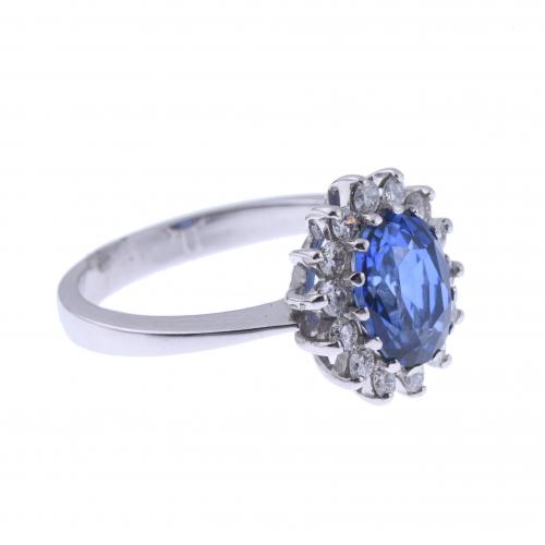 SAPPHIRE AND DIAMONDS ROSETTE RING.