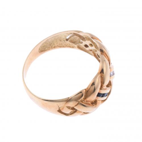 BRAIDED RING WITH DIAMONDS AND SAPPHIRES.