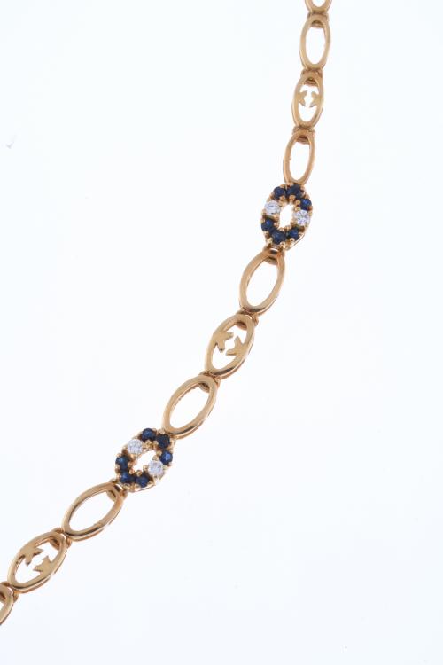 NECKLACE WITH DIAMONDS AND SAPPHIRES.