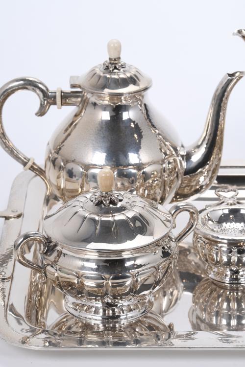 SILVER AND BONE COFFEE AND TEA SET, 20TH CENTURY.
