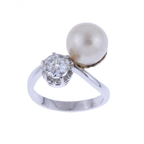 YOU AND ME RING WITH DIAMOND AND PEARL.