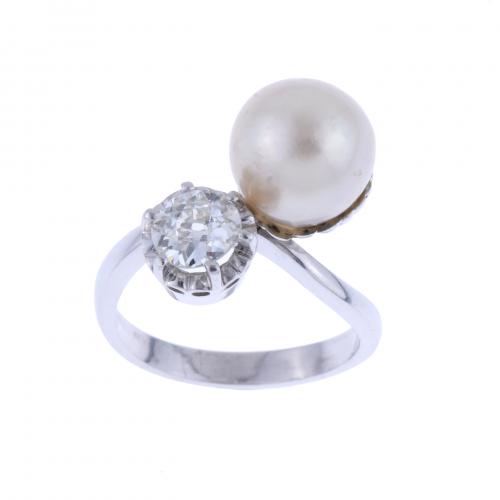 YOU AND ME RING WITH DIAMOND AND PEARL.