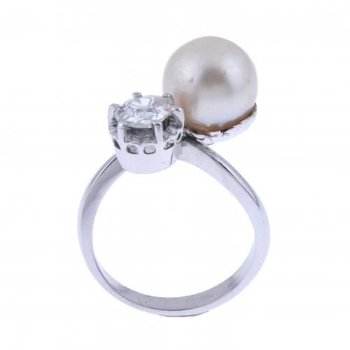 YOU AND ME RING WITH DIAMOND AND PEARL.