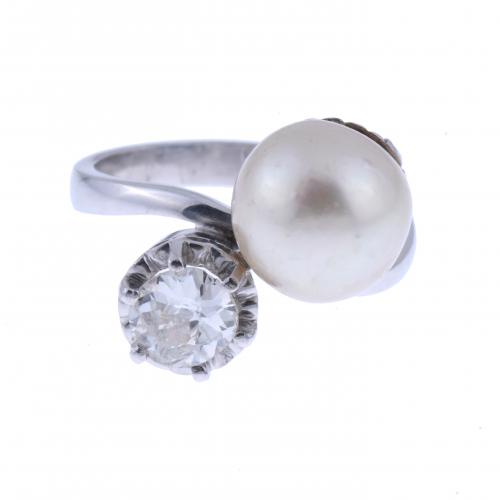 YOU AND ME RING WITH DIAMOND AND PEARL.