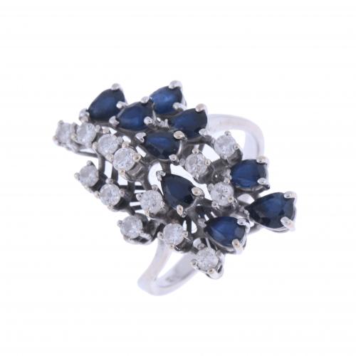 DIAMONDS AND SAPPHIRES CLUSTER RING.