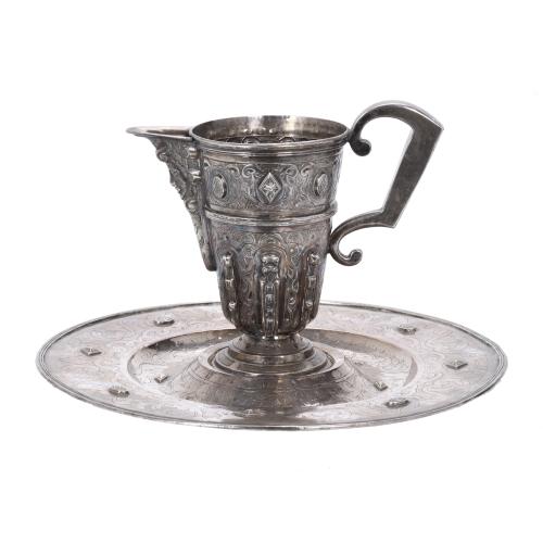 CIRCLE OF GARCÍA DE SAHAGÚN (1551-1617). SILVER SPOUTED PITCHER AND PLATTER, 17TH CENTURY. 