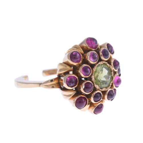 RUBIES AND GREEN TOURMALINE ROSETTE RING.