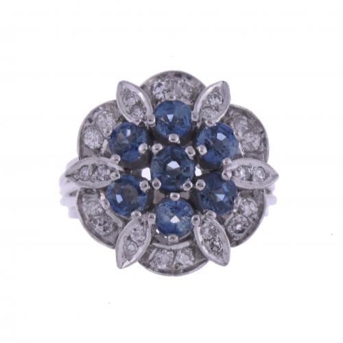 LARGE FLORAL RING WITH SAPPHIRES AND DIAMONDS.