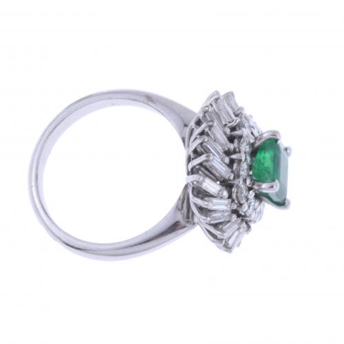 DIAMONDS AND EMERALD DANCER RING.