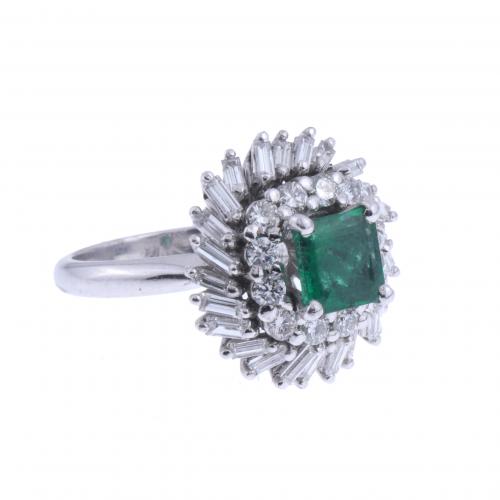 DIAMONDS AND EMERALD DANCER RING.