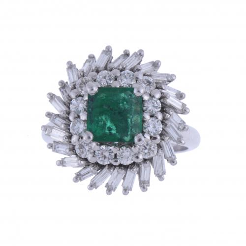 DIAMONDS AND EMERALD DANCER RING.