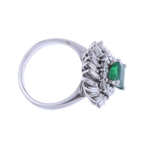 DIAMONDS AND EMERALD DANCER RING.