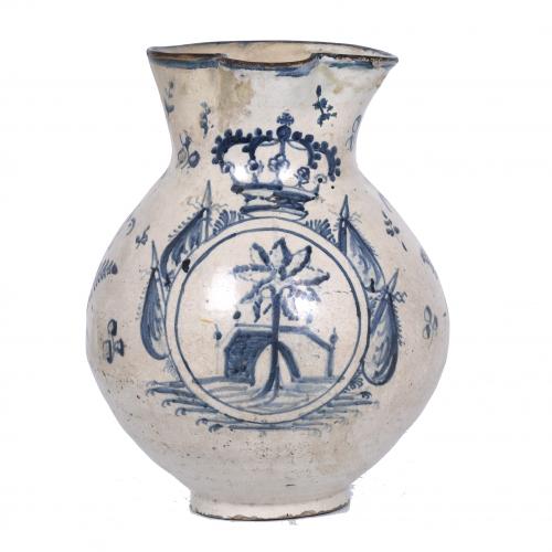 TALAVERA JUG WITH A SHIELD, 19TH CENTURY.
