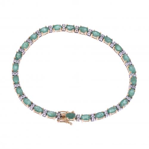 EMERALDS AND DIAMONDS RIVIÈRE BRACELET.