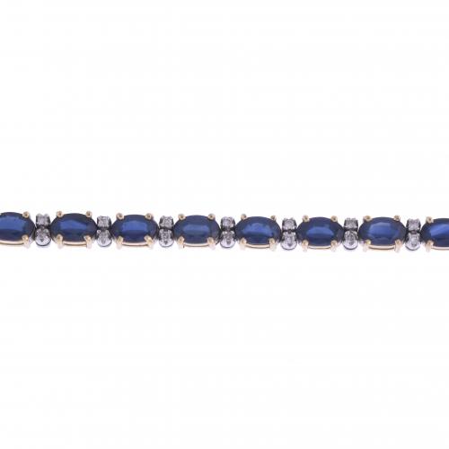 RIVIÈRE BRACELET WITH SAPPHIRES AND DIAMONDS.