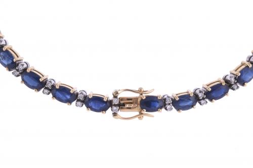 RIVIÈRE BRACELET WITH SAPPHIRES AND DIAMONDS.