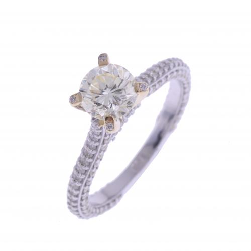 SOLITAIRE RING WITH FANCY LIGHT YELLOW DIAMOND.