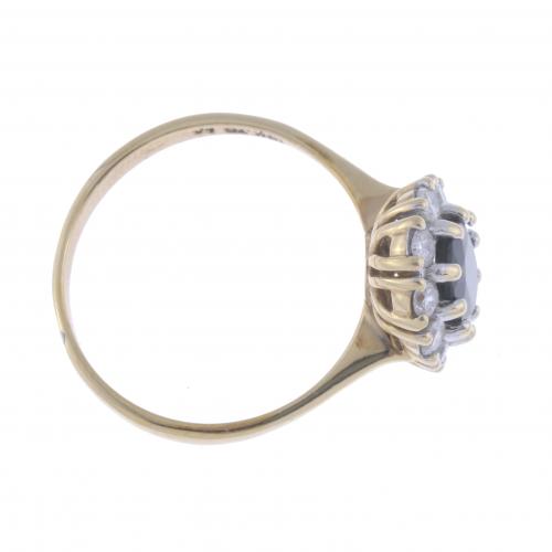 ROSETTE RING WITH SAPPHIRE AND DIAMONDS.