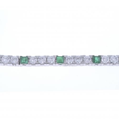 PULSERA RIVIÈRE DE DIAMANTES Y ESMERALDAS.