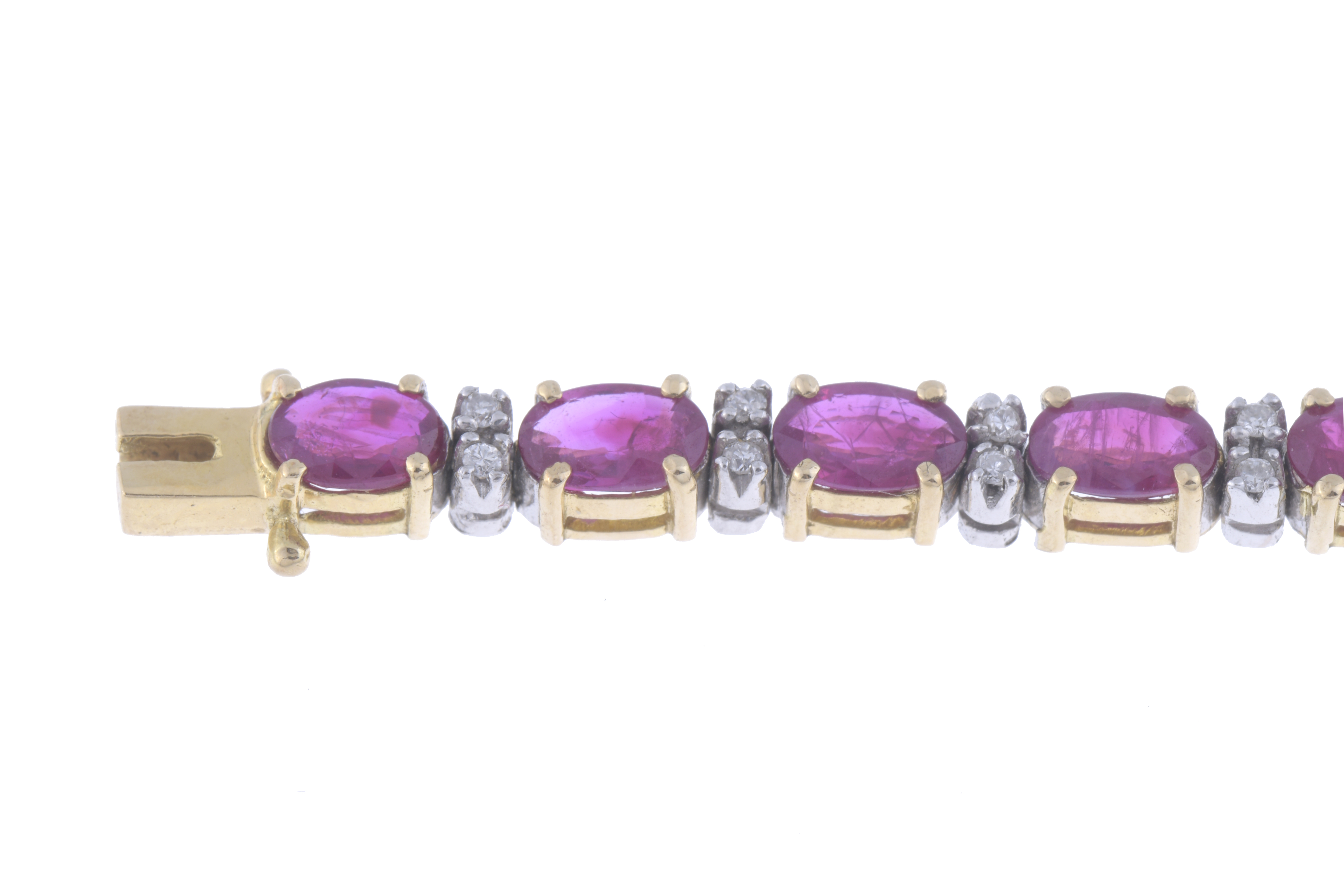 PULSERA RIVIÈRE CON RUBÍES Y DIAMANTES.
