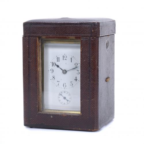 TRAVEL ALARM CLOCK, EARLY 20TH CENTURY.