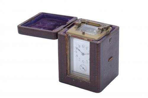 TRAVEL ALARM CLOCK, EARLY 20TH CENTURY.