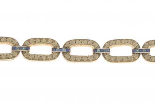 GEMSTONES LINKS BRACELET, EARLY 20TH CENTURY.