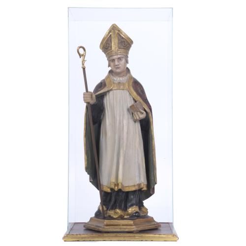 19TH CENTURY, SPANISH SCHOOL. CARVING OF A BISHOP WITH A BOOK.